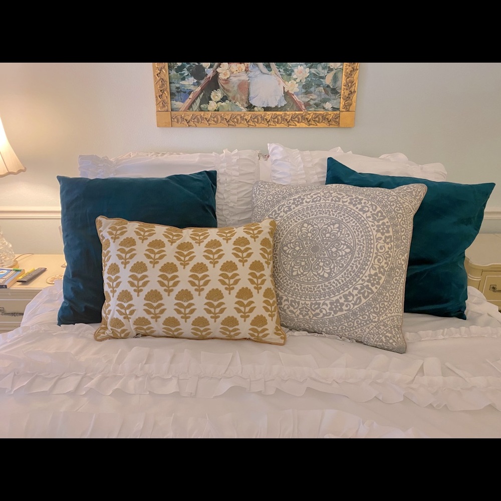 Yellow floral embroidered pillow